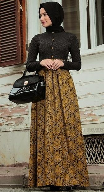 dress brokat kombinasi warna hitam dengan kuning emas